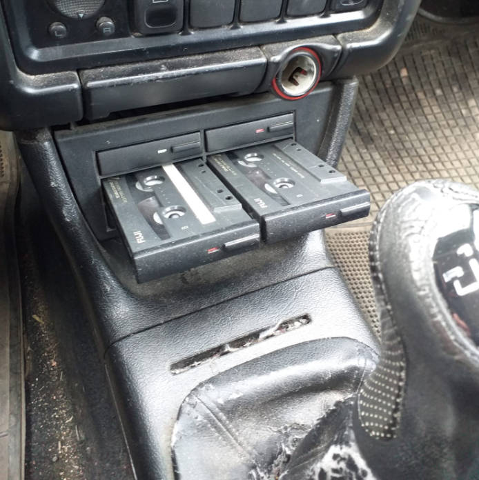 cargador de cassettes para el coche